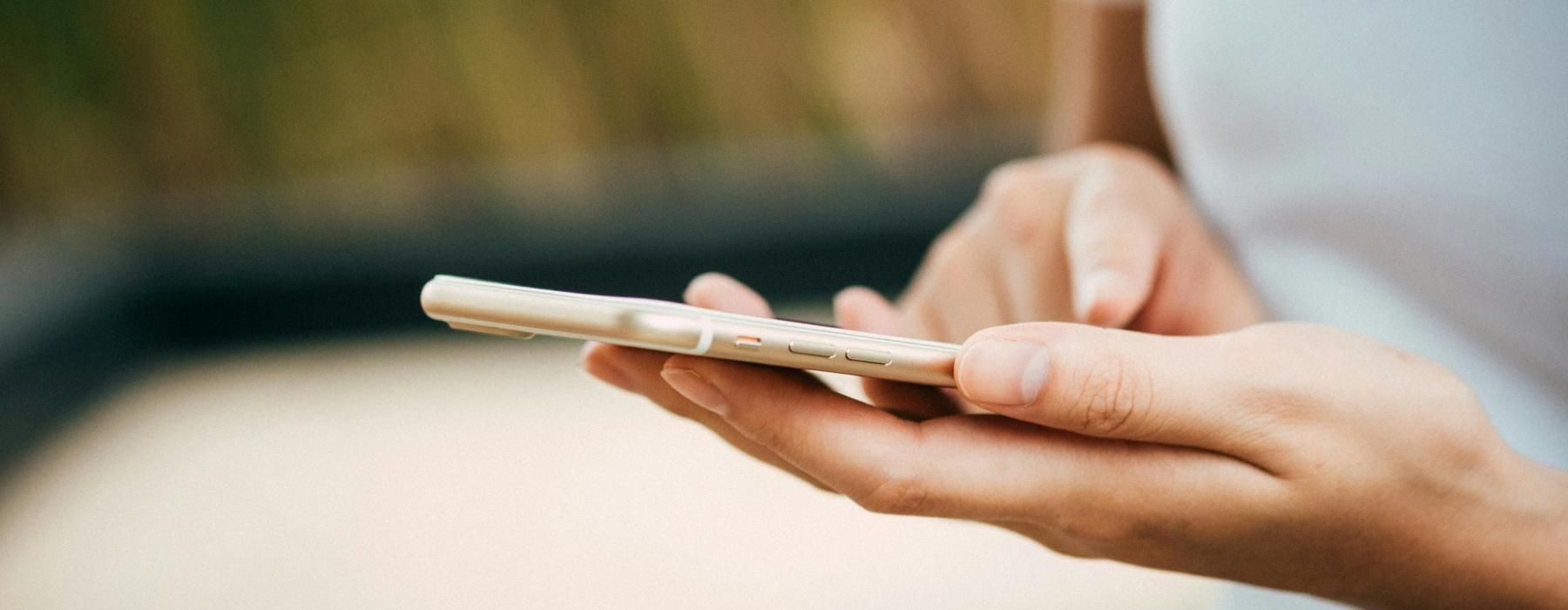 a close-up of a person holding a phone