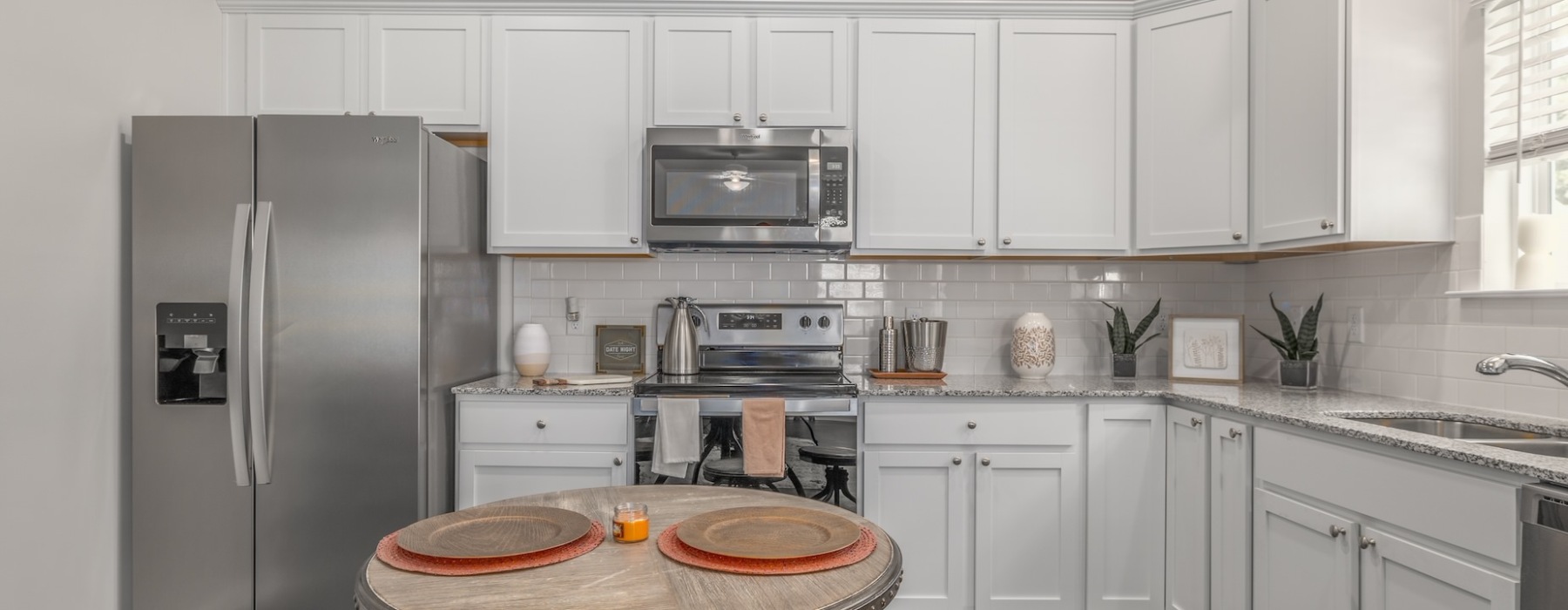 kitchen with bright lighting and ample counter space