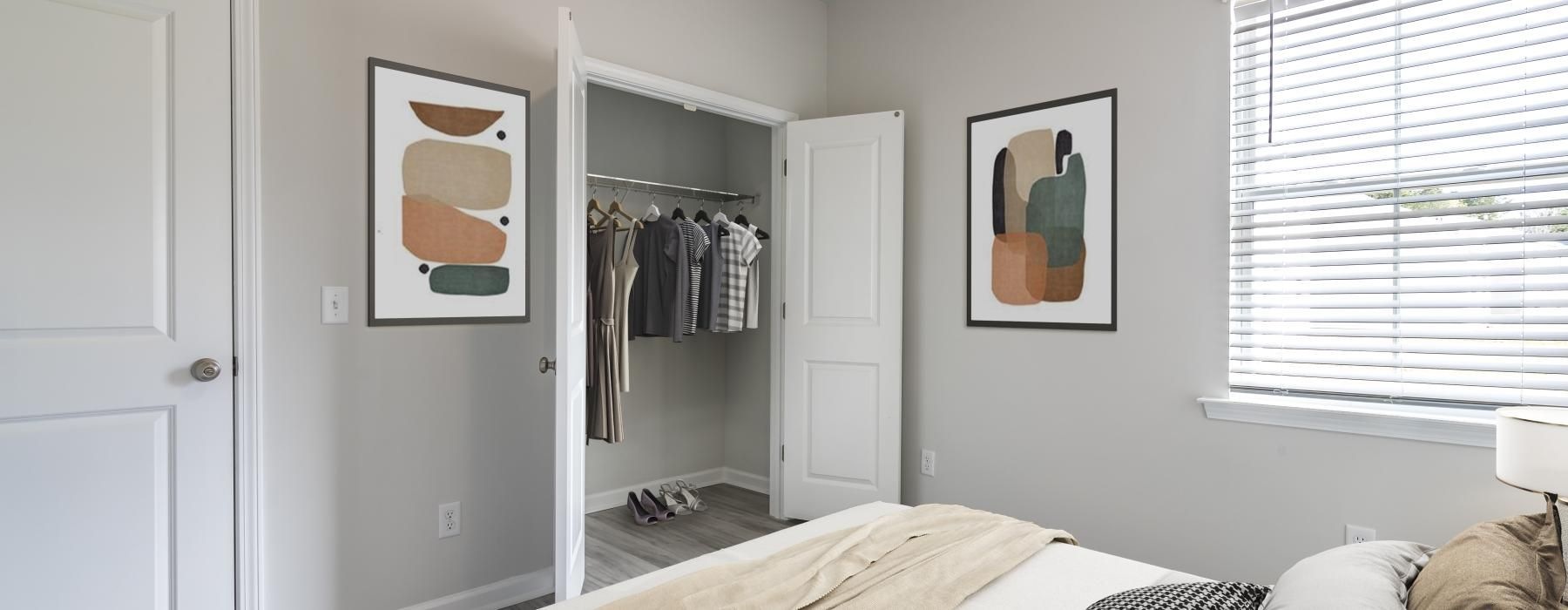 a bedroom with a bed and a closet